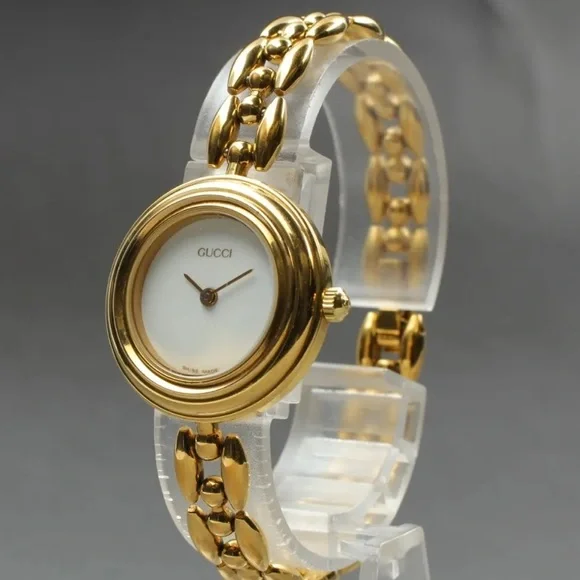 - Gucci Luxury RARE highly collectible bracelet watch Gucci Luxury RARE highly collectible bracelet watch main image 2